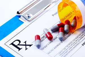 Photo of prescription pad with pills